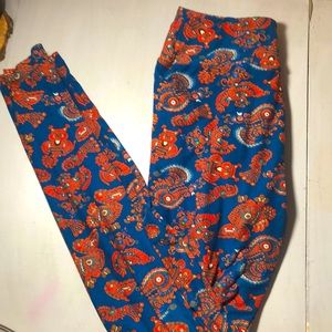 Blue and orange colored mandala leggings